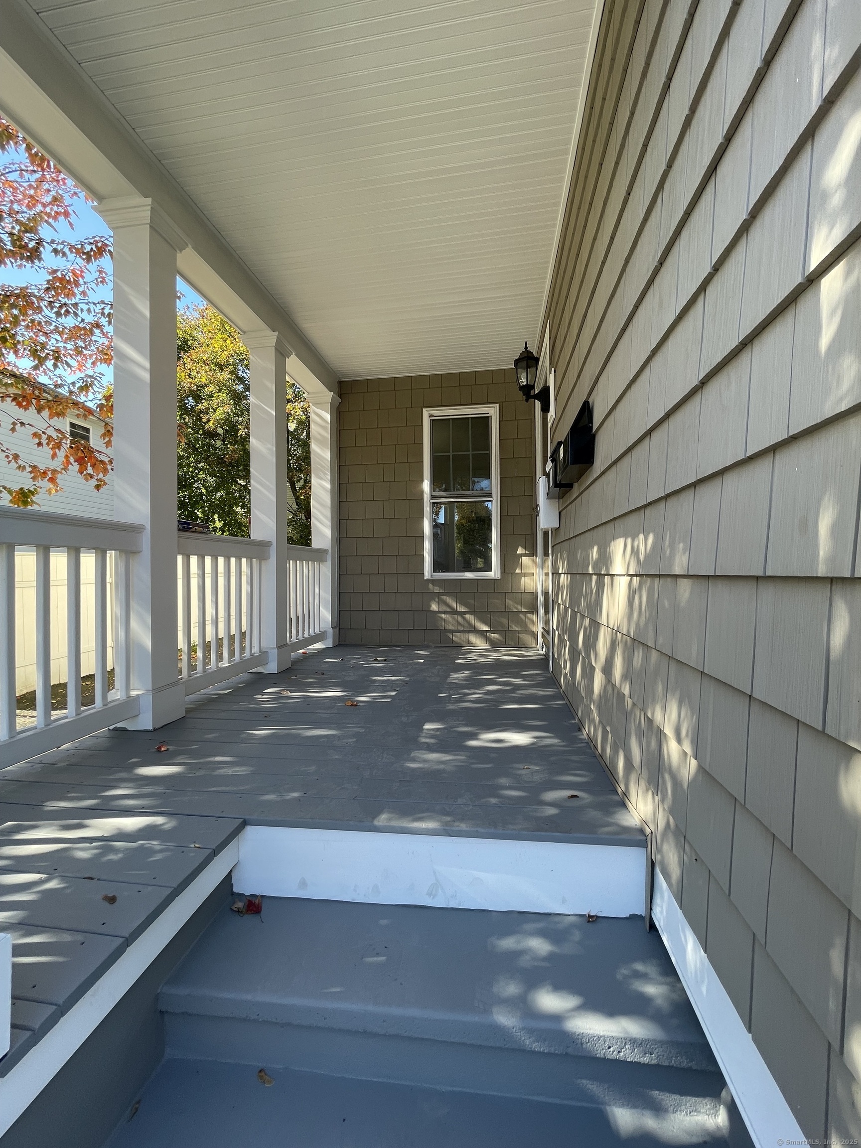 687 Hallett Street Bridgeport, CT 06608 - Photo 2 of 5 a view of a house with a porch
