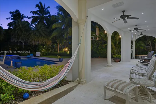 a view of a swimming pool with an outdoor space