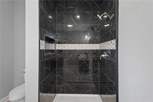 a view of balcony with wooden floor and fence