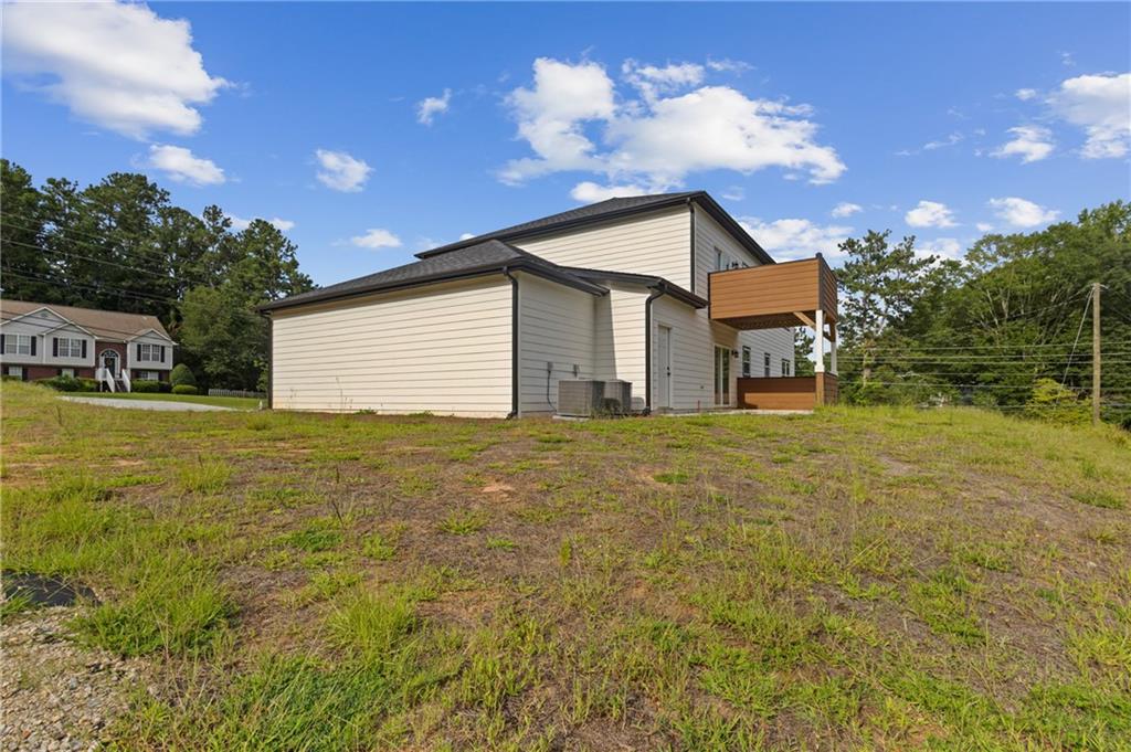 1275 Riverside Road Sugar Hill, GA 30518 - Photo 14 of 17 a house view with a swimming pool