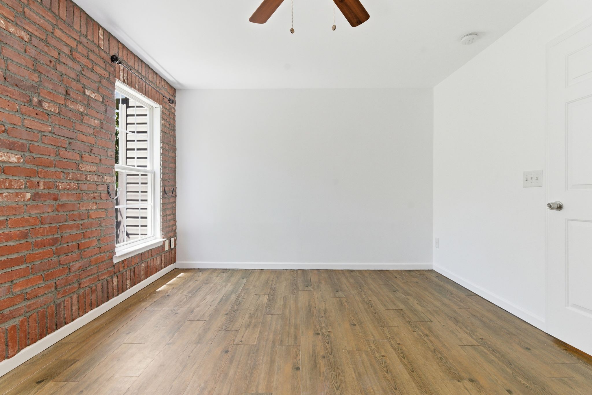 3401 Anderson Road, Unit 4 Antioch, TN 37013 - Photo 34 of 55 a view of an empty room and wooden floor