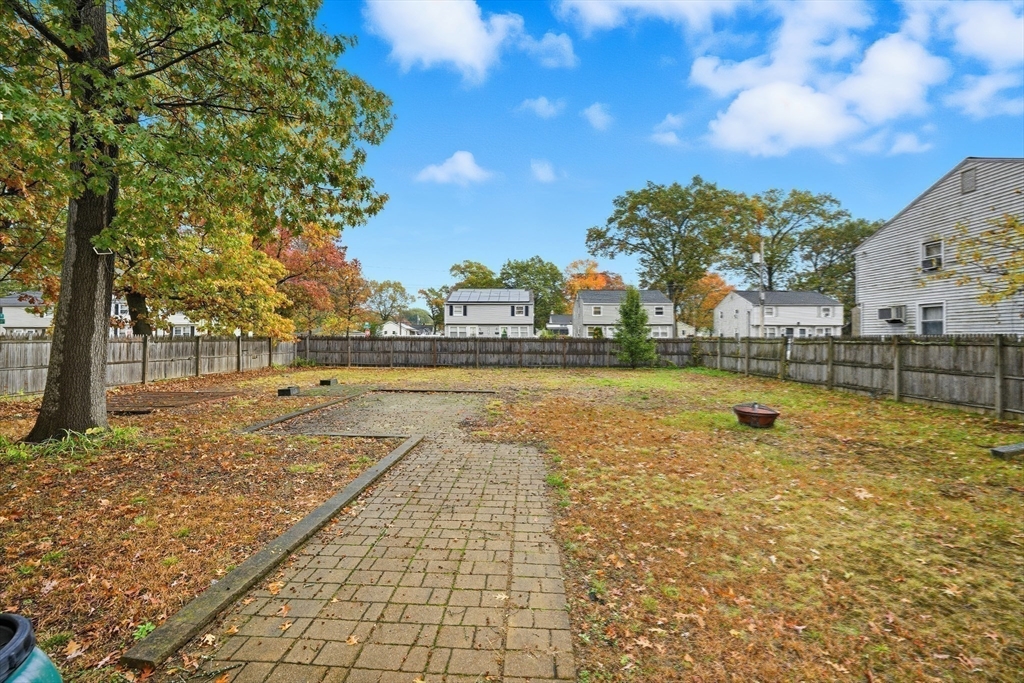 63 Peer Street Springfield, MA 01109 - Photo 29 of 41 a view of swimming pool with outdoor seating and plants