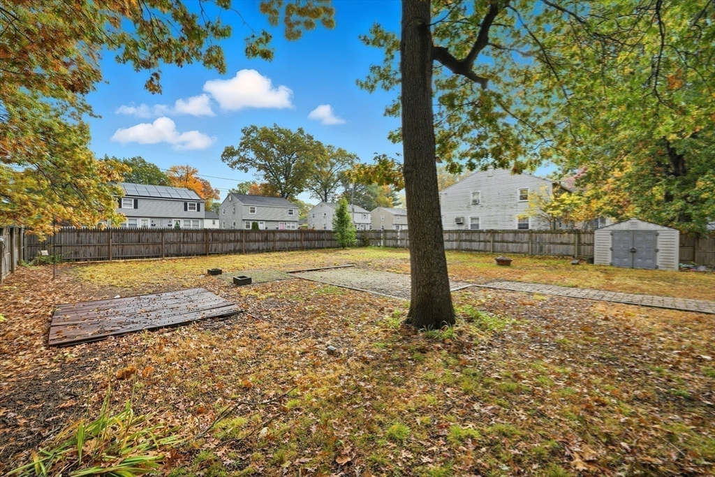 63 Peer Street Springfield, MA 01109 - Photo 30 of 41 a view of a yard with swimming pool