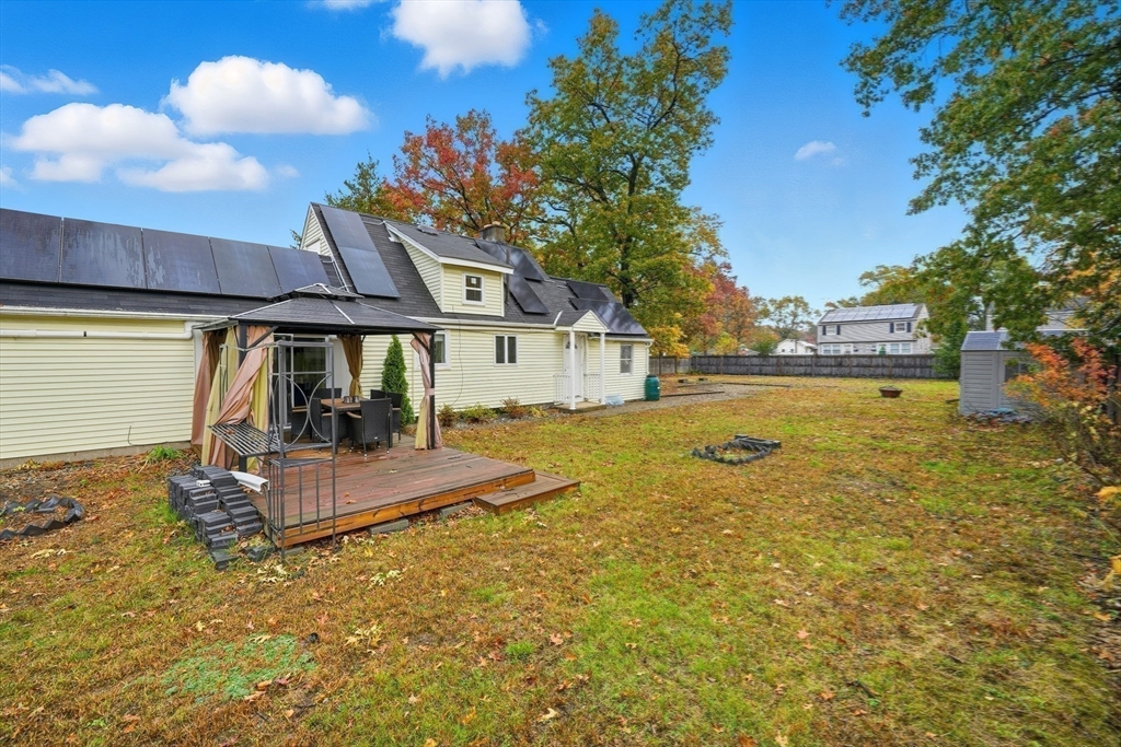 63 Peer Street Springfield, MA 01109 - Photo 36 of 41 a view of a house with backyard and tree