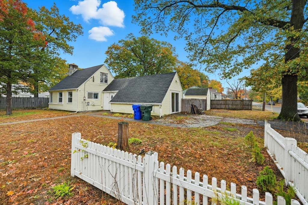 63 Peer Street Springfield, MA 01109 - Photo 5 of 41 a view of house with wooden fence