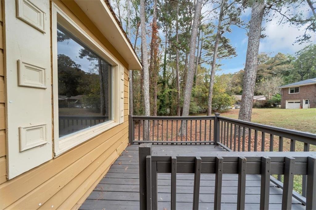 4161 Tell Road Southwest, Unit B Atlanta, GA 30331 - Photo 15 of 16 a view of a balcony with wooden floor