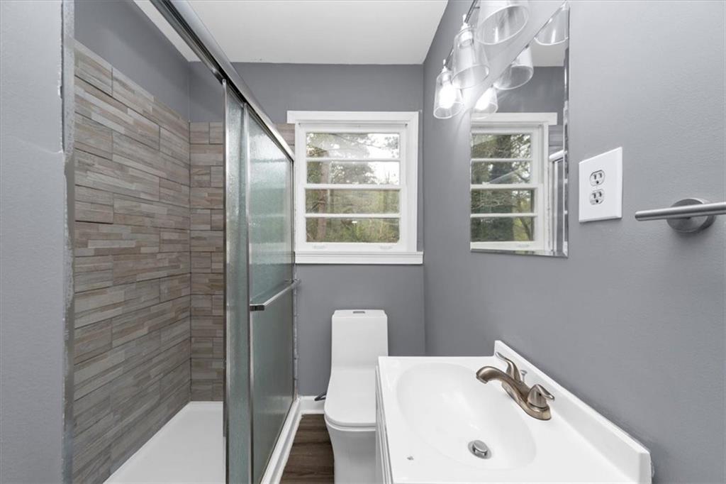 4161 Tell Road Southwest, Unit B Atlanta, GA 30331 - Photo 8 of 16 a bathroom with a sink and a toilet