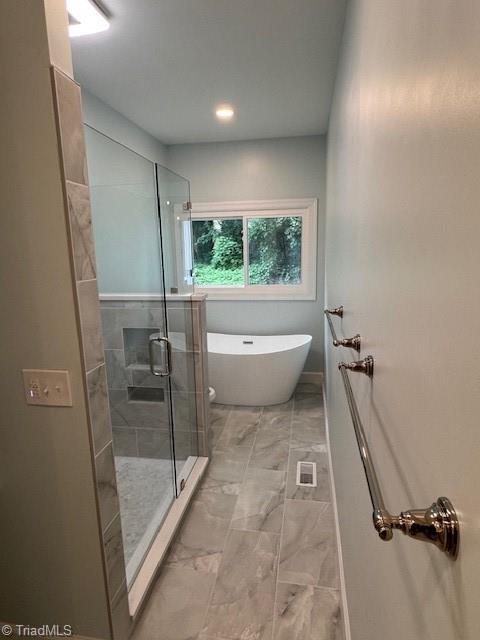 1247 Stadler Ridge Road Winston-Salem, NC 27106 - Photo 19 of 32 Primary Bathroom with glass shower soaker tub