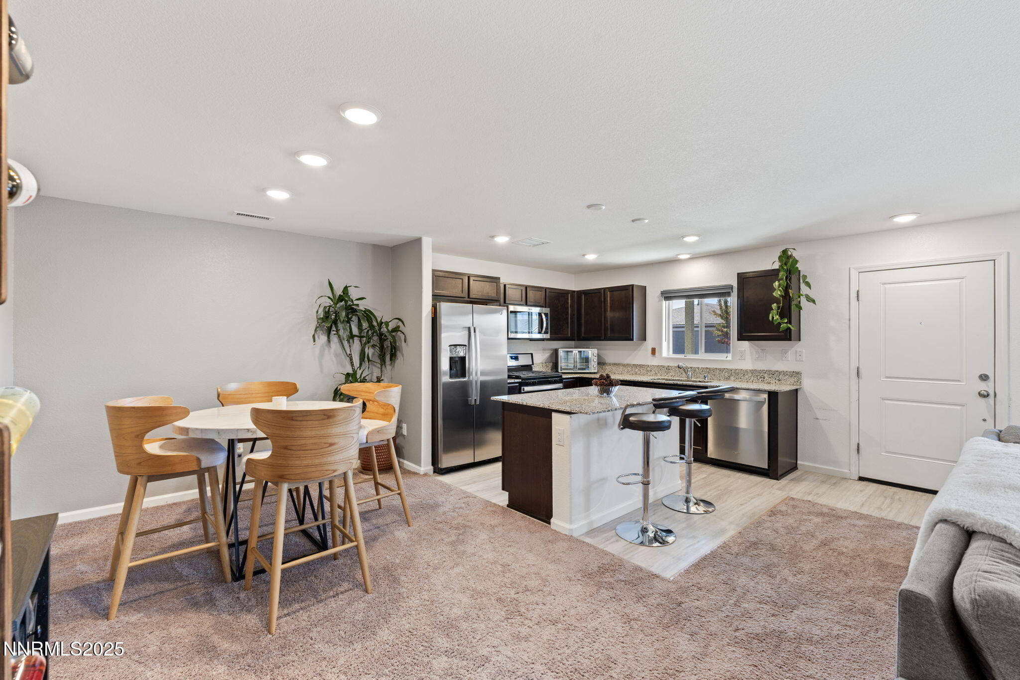 673 Mcgill Drive Reno, NV 89506 - Photo 6 of 34 a kitchen with a table and chairs in it