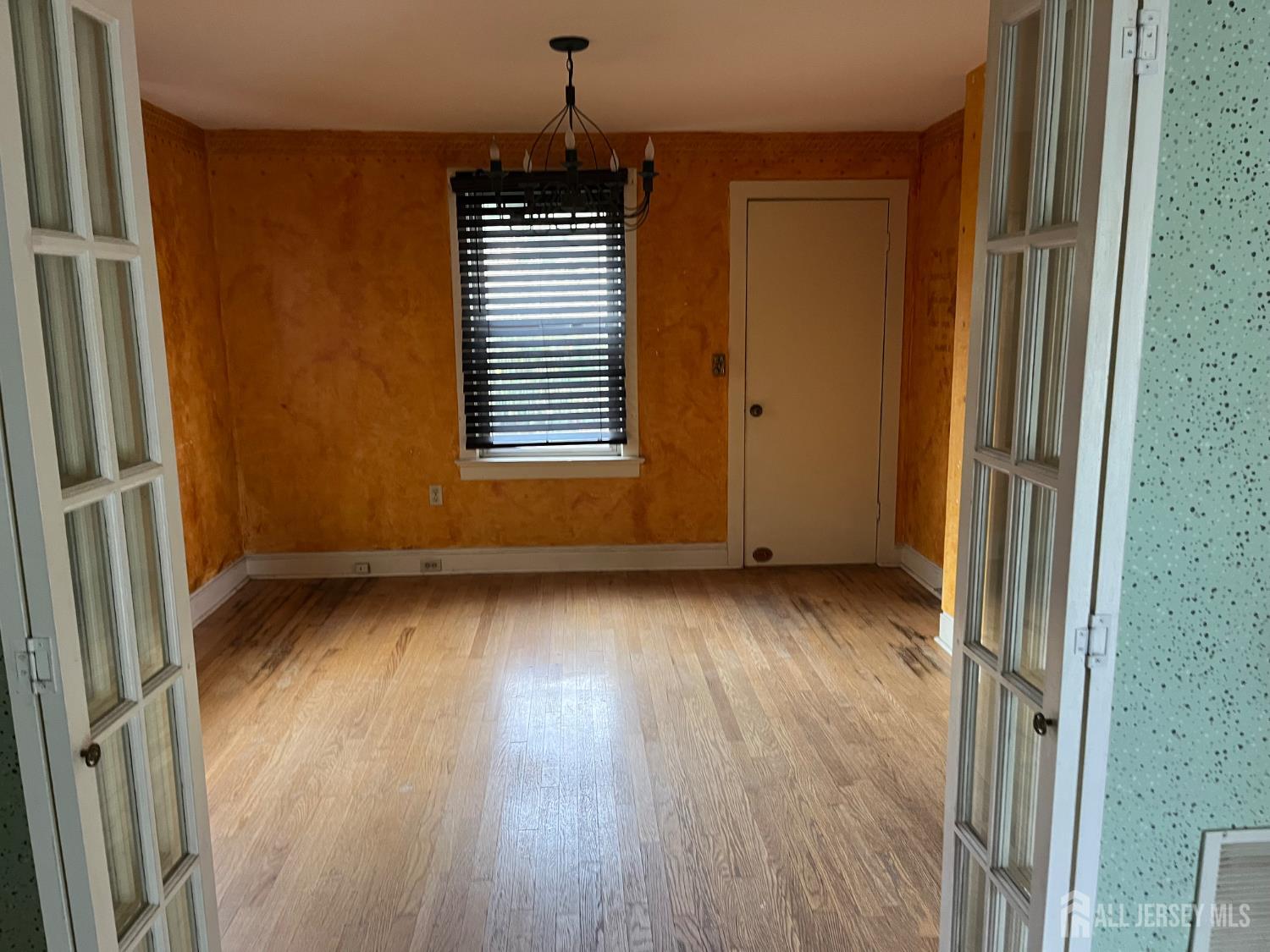 45 Old New Road Monmouth Junction, NJ 08852 - Photo 11 of 22 an empty room with wooden floor and windows