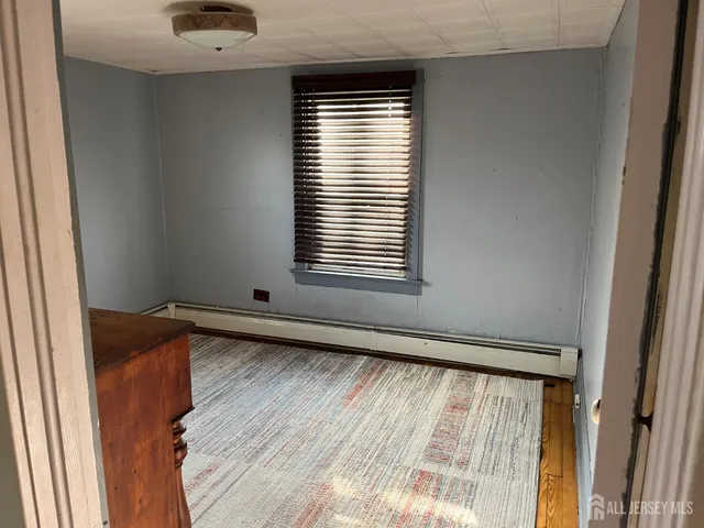 a view of a room with a window