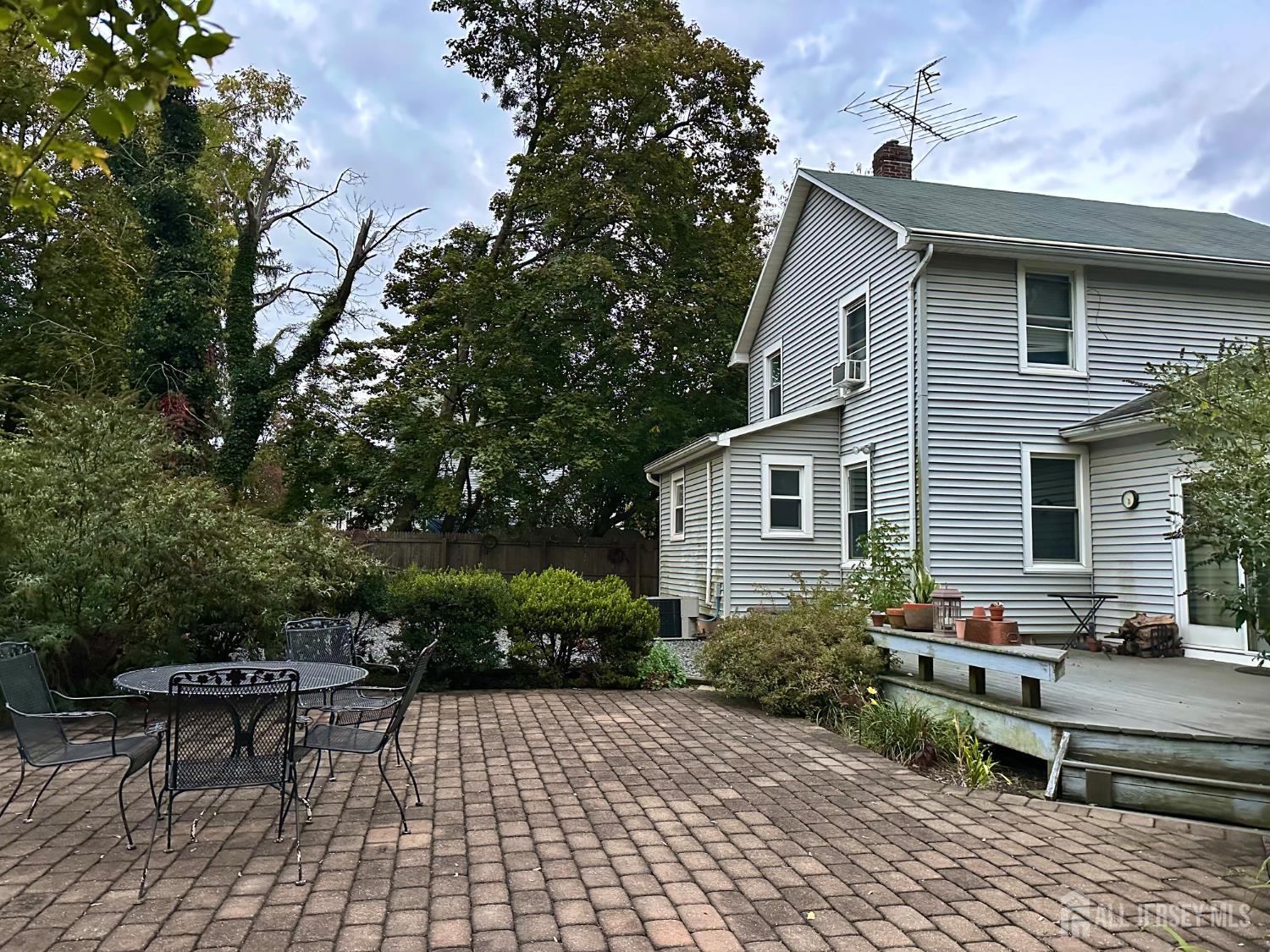 45 Old New Road Monmouth Junction, NJ 08852 - Photo 4 of 22 a backyard of a house with outdoor seating