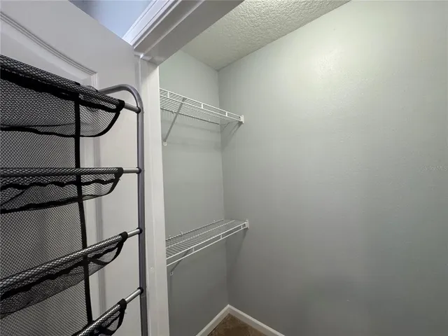 a view of a room with rack on the wall