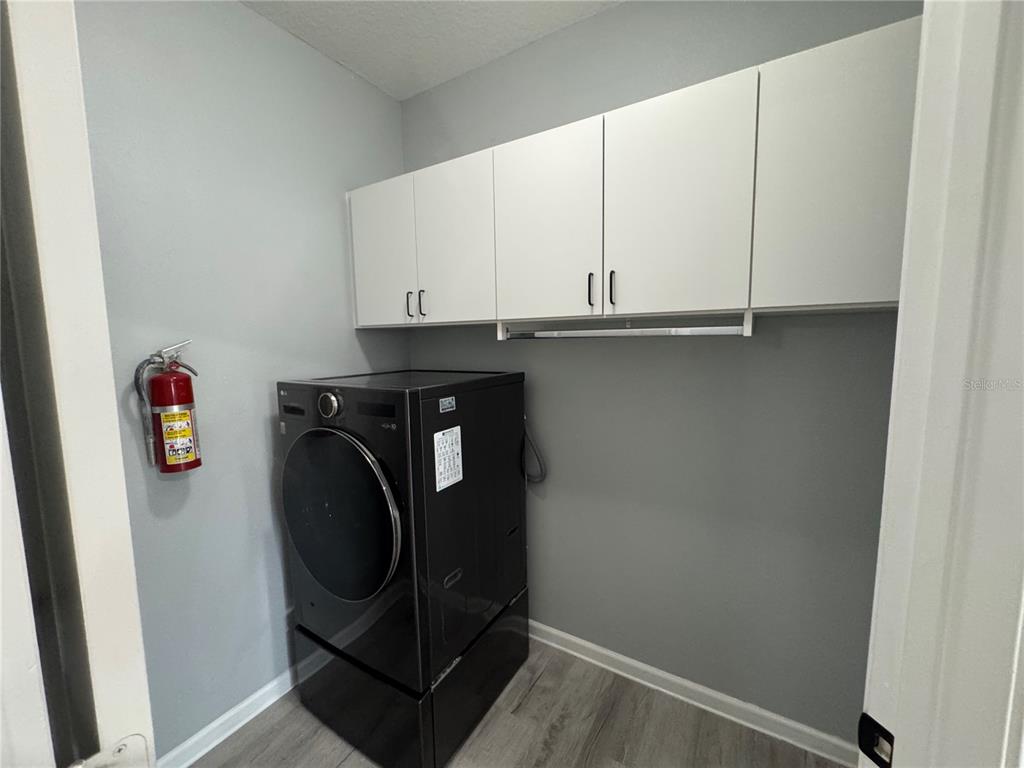 10444 Villa View Circle Tampa, FL 33647 - Photo 22 of 29 a utility room with dryer and washer