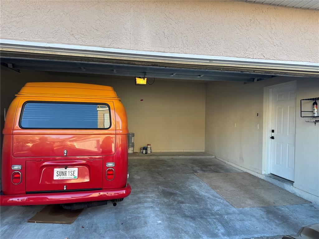 10444 Villa View Circle Tampa, FL 33647 - Photo 24 of 29 a kitchen with a stove and a microwave