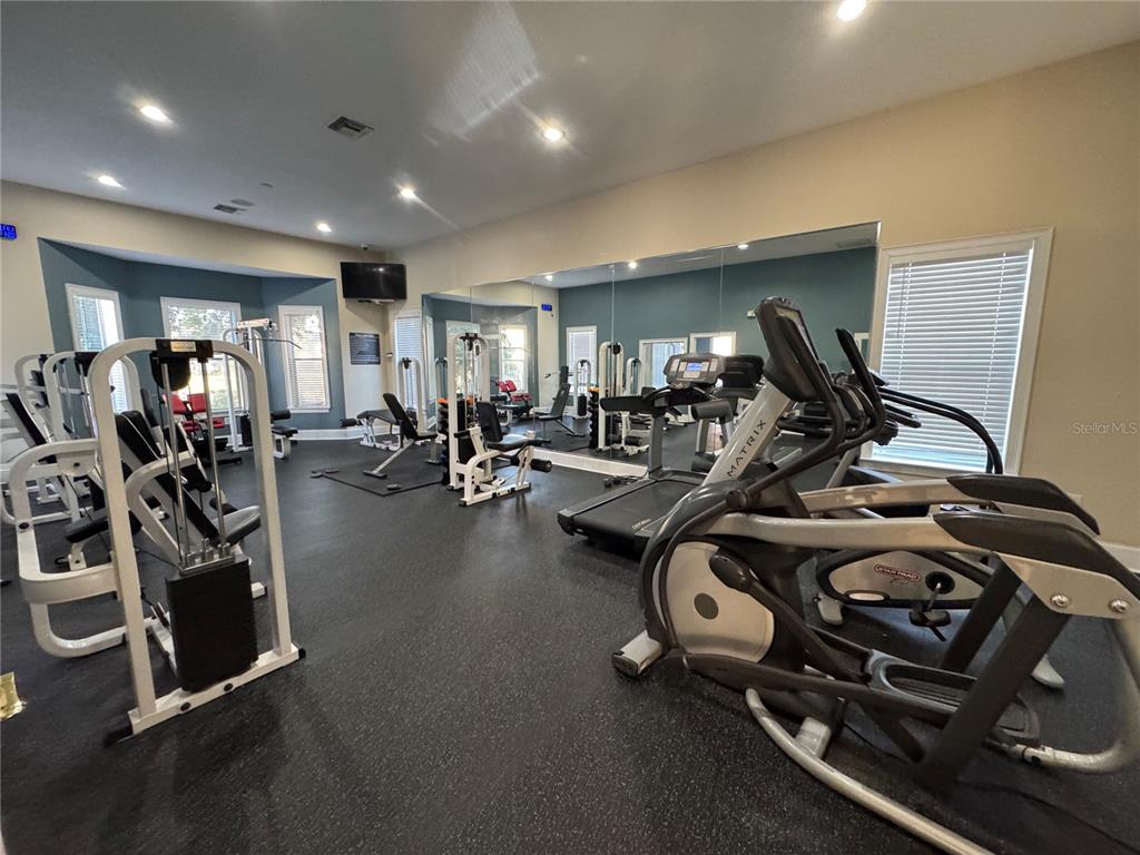 10444 Villa View Circle Tampa, FL 33647 - Photo 27 of 29 a view of a room with gym equipment