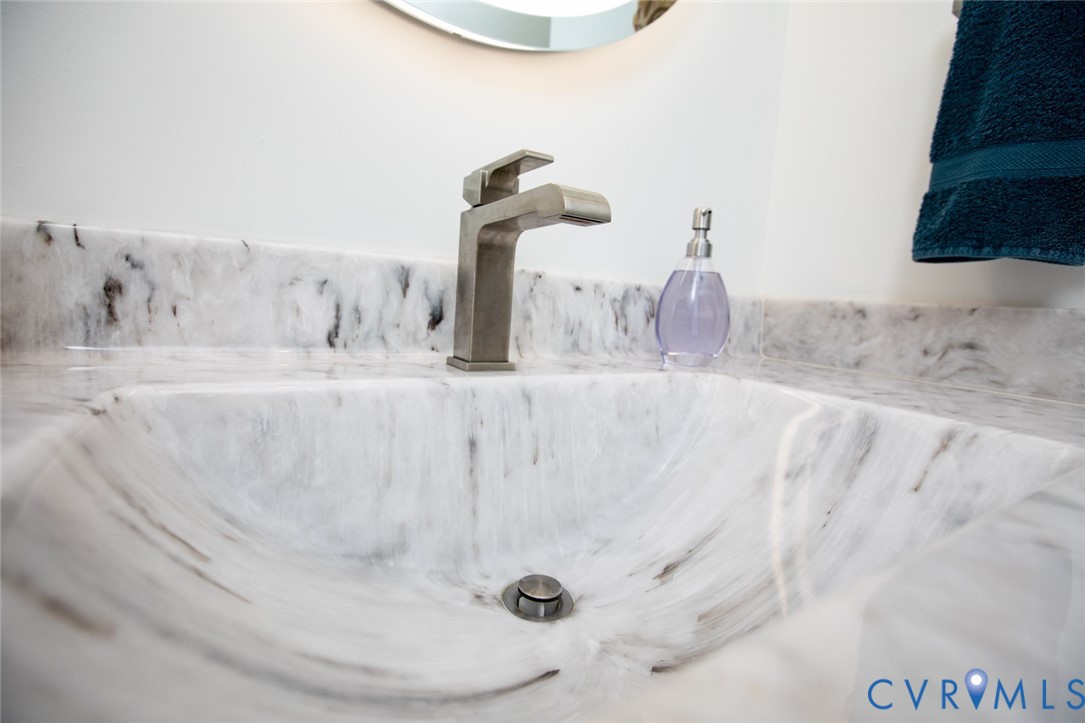 567 Monroe Church Road Rice, VA 23966 - Photo 39 of 83 Integrated stone sink with a matte silver faucet,