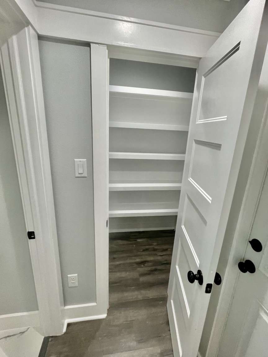 12122 Chimney Rock Road Houston, TX 77035 - Photo 11 of 33 a view of walk in closet with empty racks