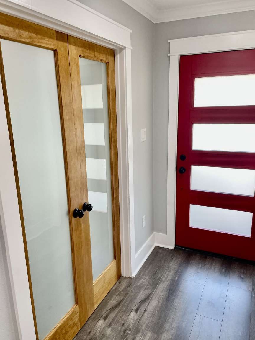 12122 Chimney Rock Road Houston, TX 77035 - Photo 14 of 33 a view of front door with wooden floor