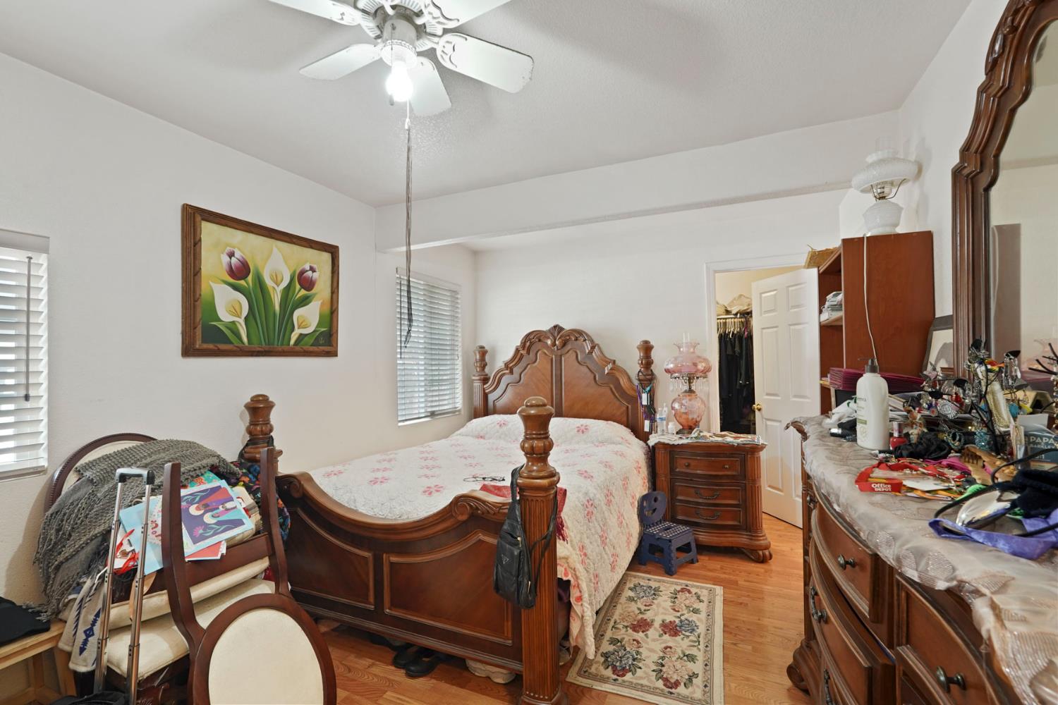 1234 Perry Avenue Stockton, CA 95203 - Photo 20 of 30 a living room with furniture a chandelier and a window