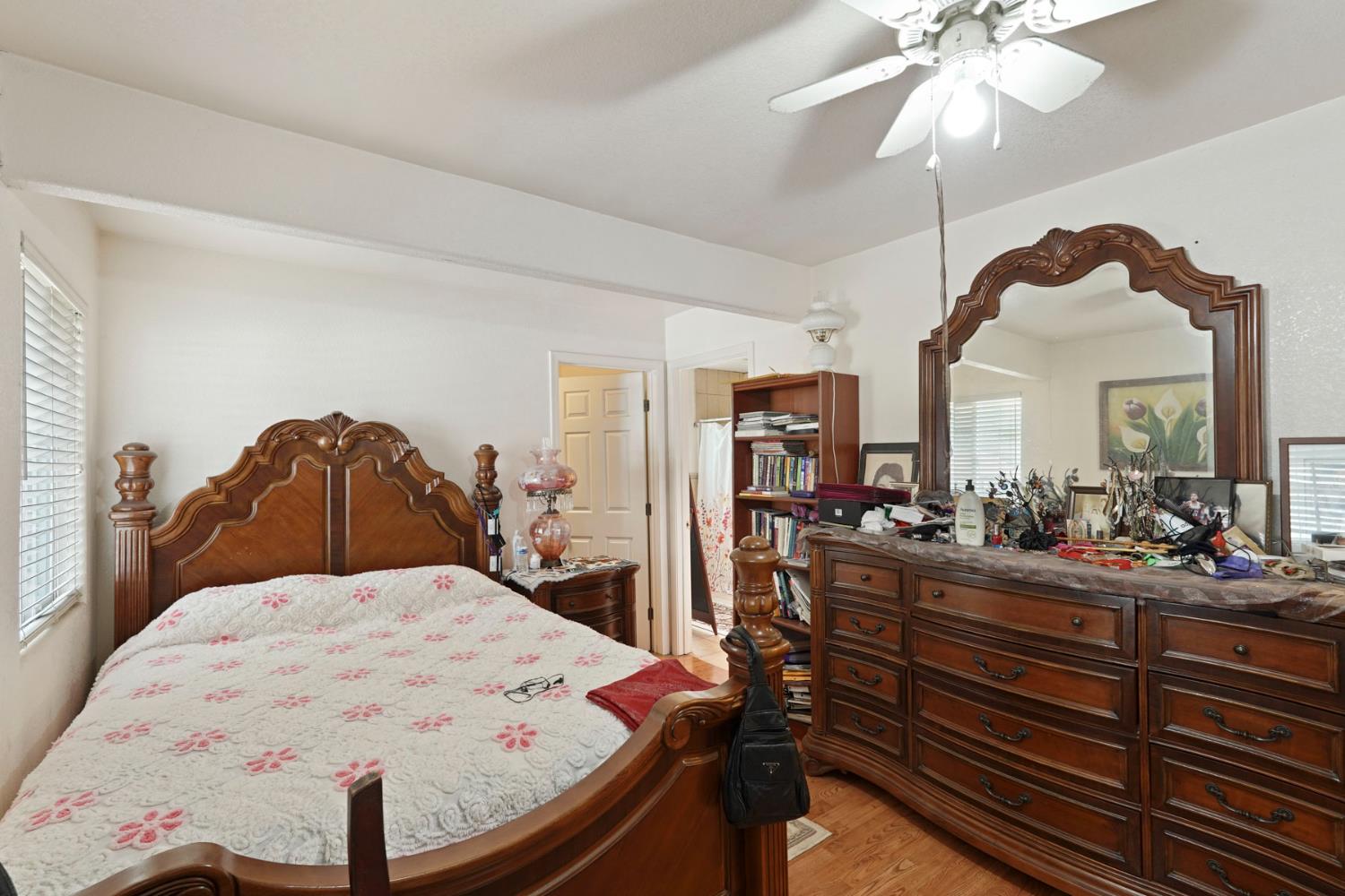 1234 Perry Avenue Stockton, CA 95203 - Photo 21 of 30 a view of a dining room with furniture and a chandelier