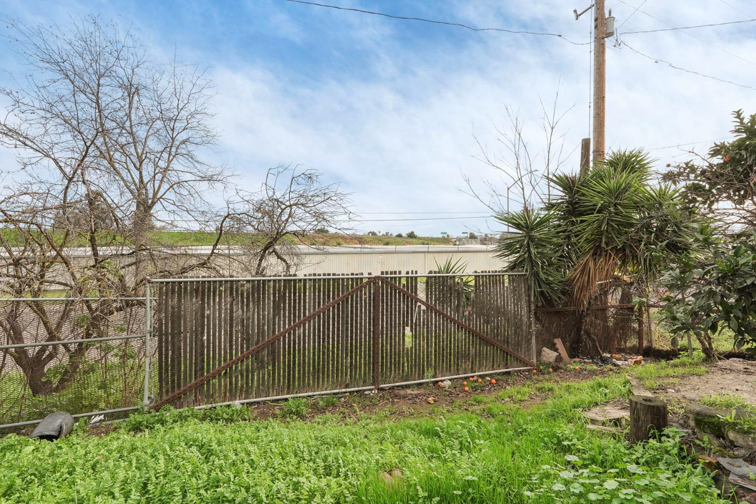 1234 Perry Avenue Stockton, CA 95203 - Photo 30 of 30 a view of a backyard