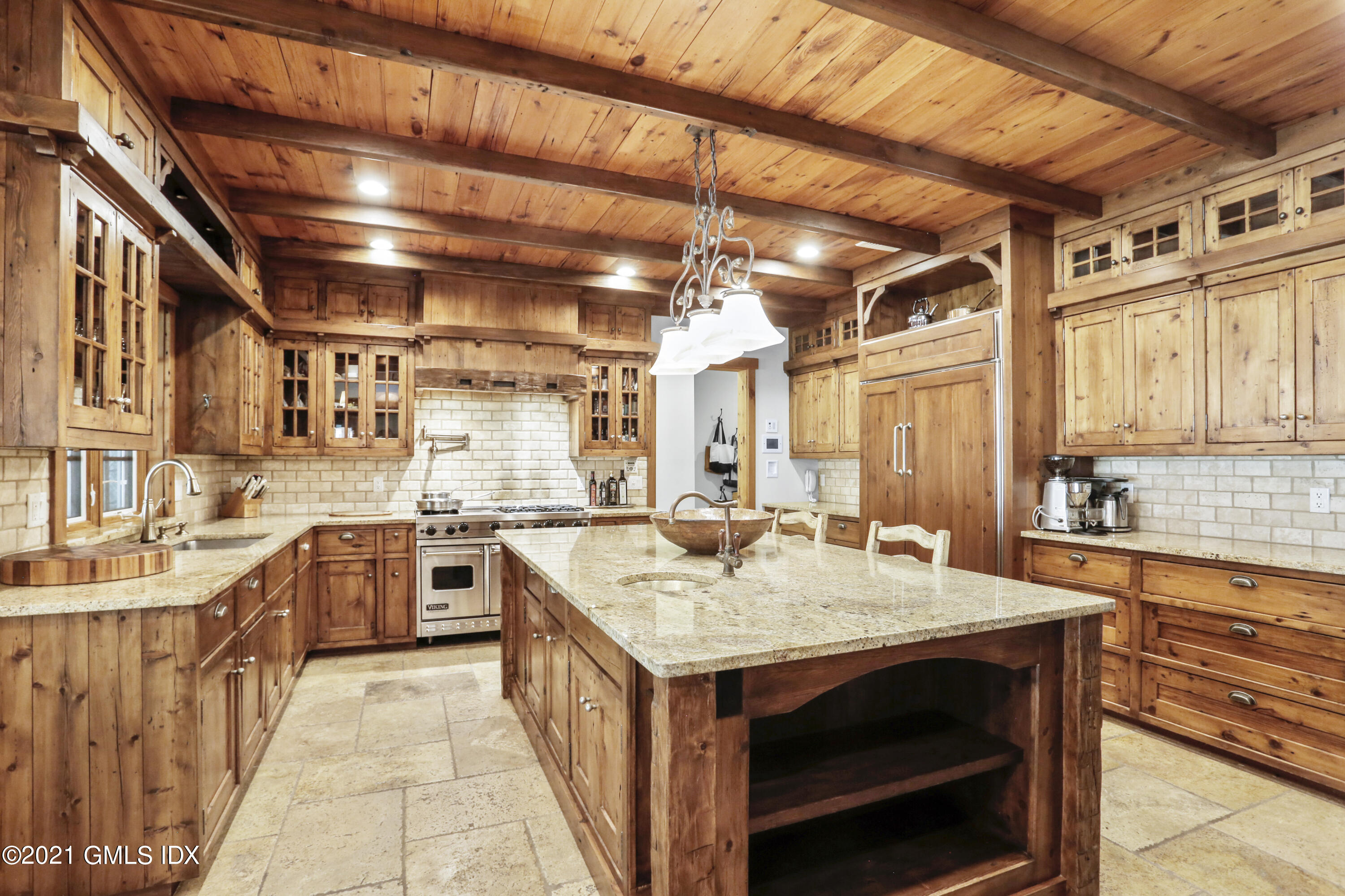 142 Cat Rock Road Cos Cob, CT 06807 - Photo 9 of 27 a kitchen with sink stove and cabinets