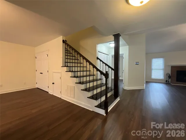a view of entryway with wooden floor