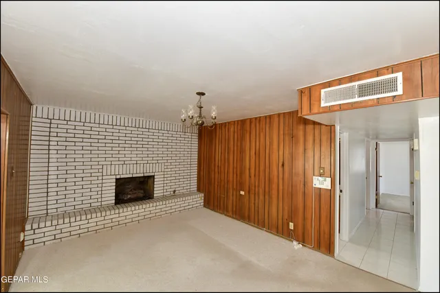 a view of a hallway with windows