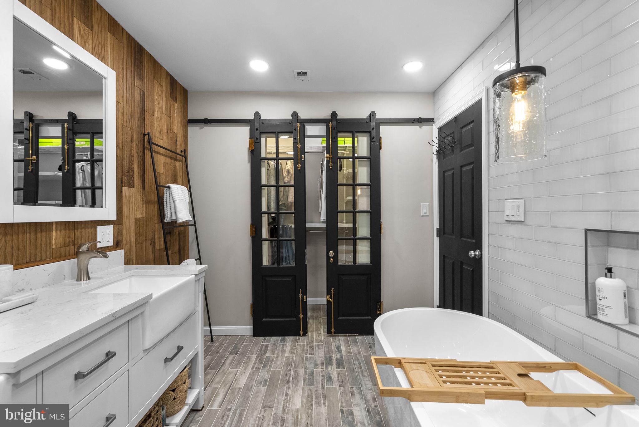 2924 Winters Chase Way Annapolis, MD 21401 - Photo 11 of 67 a bathroom with a sink and a mirror