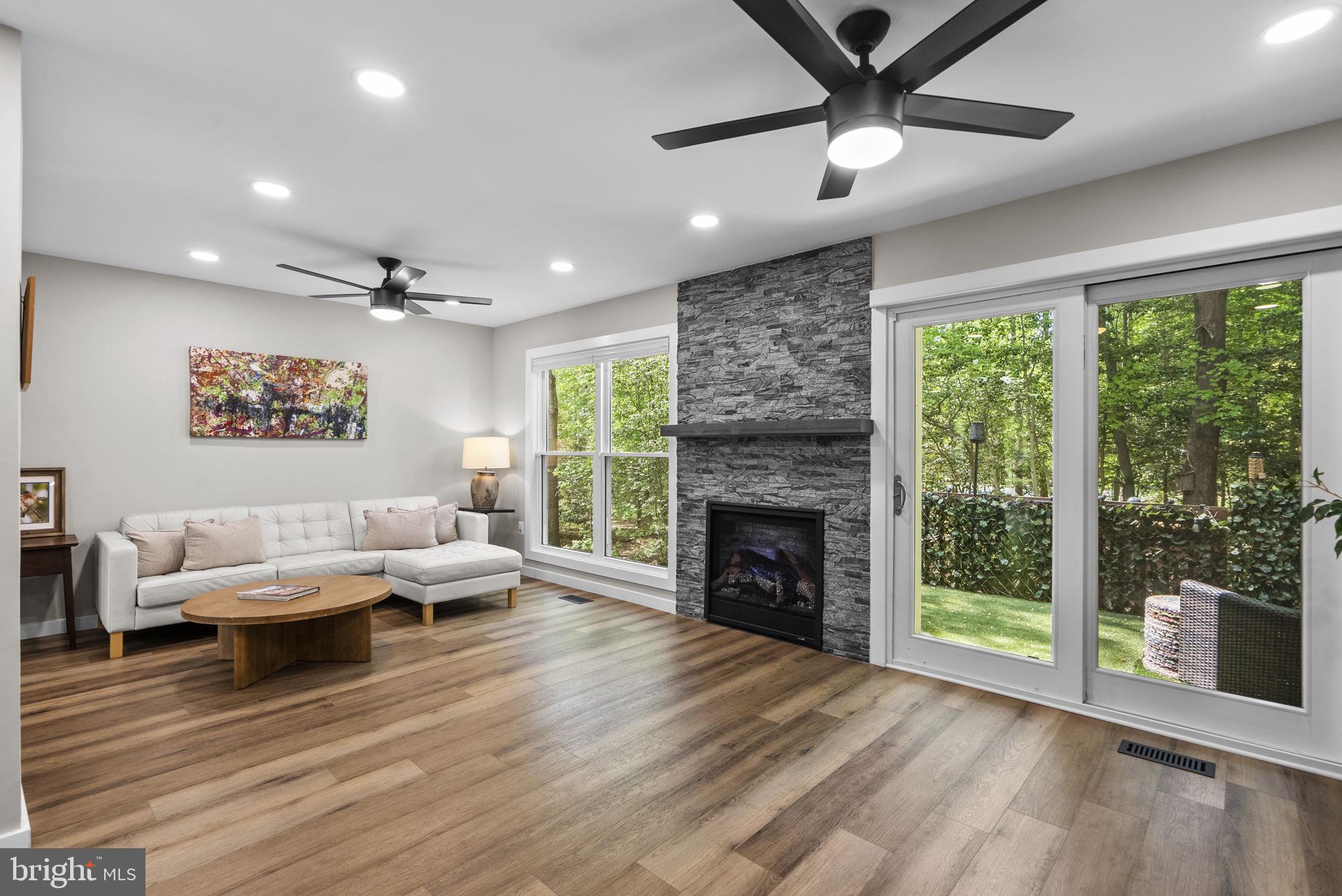 2924 Winters Chase Way Annapolis, MD 21401 - Photo 14 of 67 a living room with furniture and a fireplace