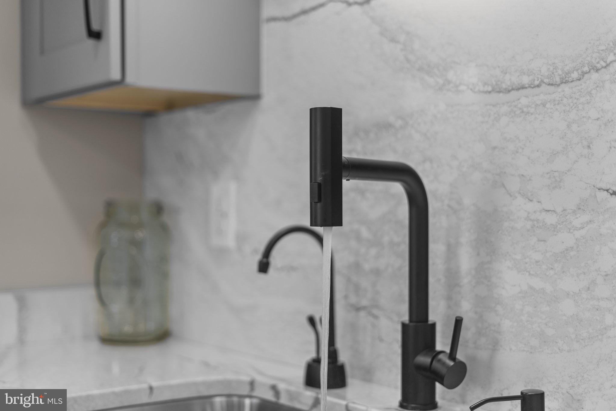 2924 Winters Chase Way Annapolis, MD 21401 - Photo 15 of 67 a close view of a faucet in the bathroom