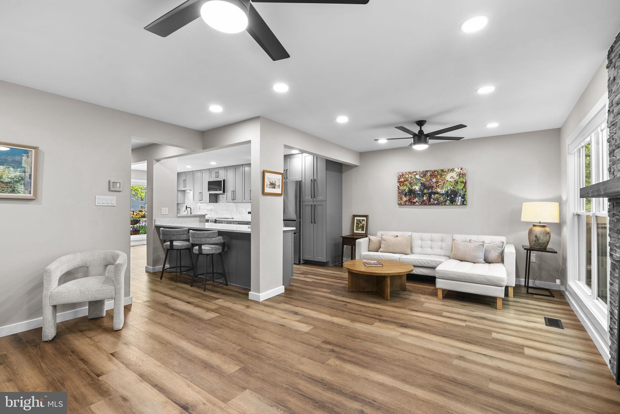 2924 Winters Chase Way Annapolis, MD 21401 - Photo 18 of 67 a living room with furniture and a wooden floor