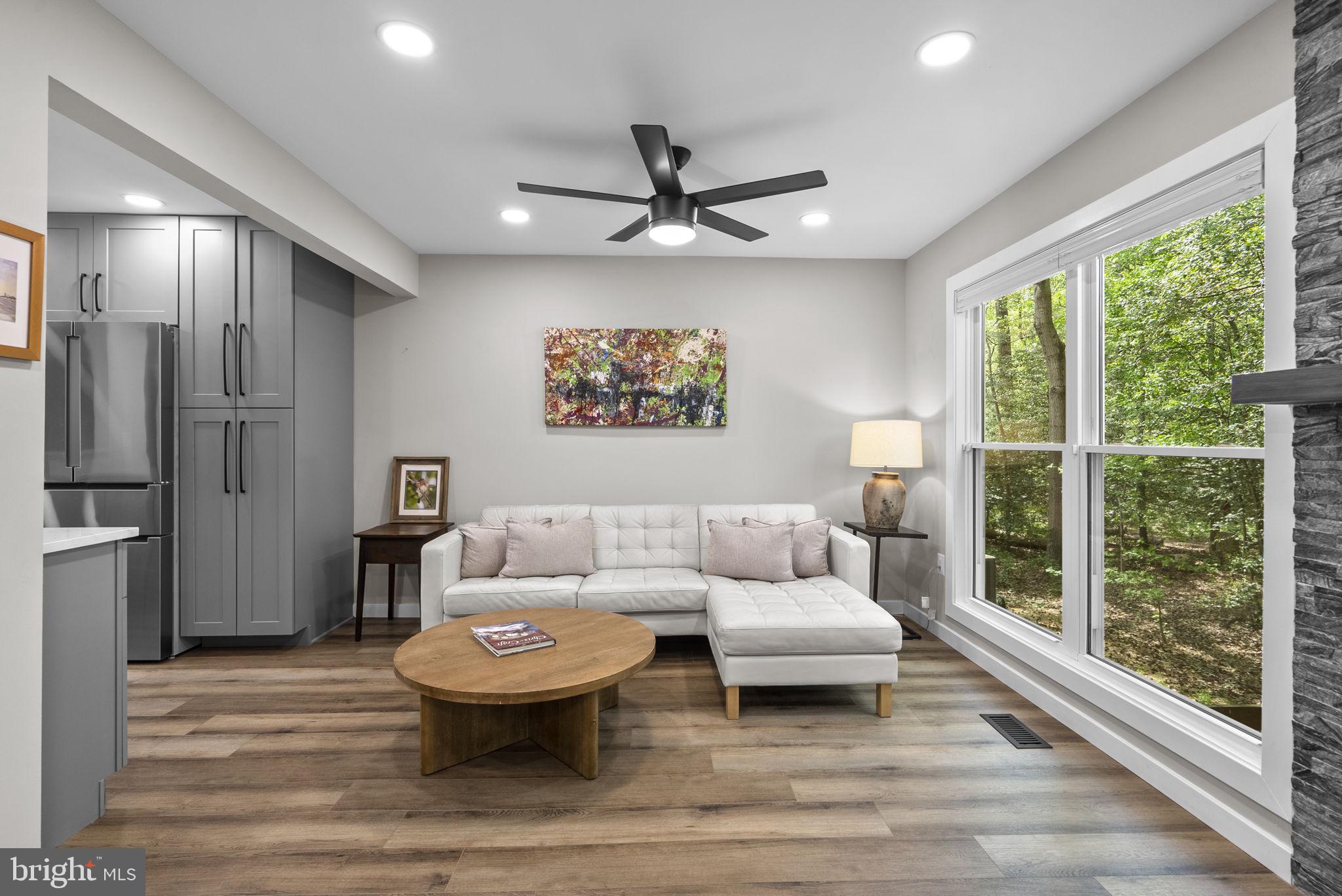 2924 Winters Chase Way Annapolis, MD 21401 - Photo 23 of 67 a living room with furniture and a large window