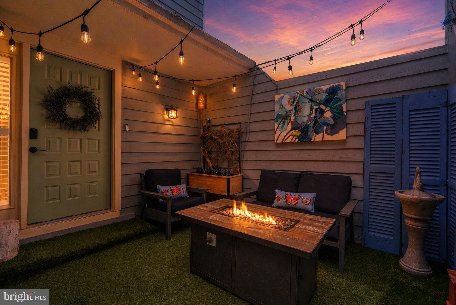 2924 Winters Chase Way Annapolis, MD 21401 - Photo 5 of 67 a living room with stainless steel appliances kitchen island furniture and a fireplace