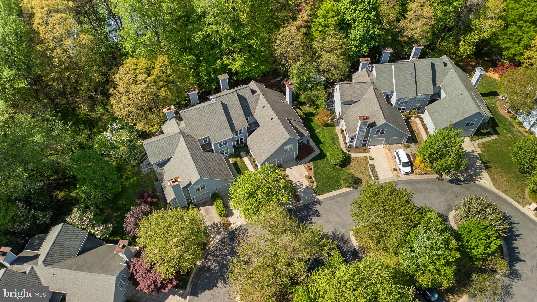 2924 Winters Chase Way Annapolis, MD 21401 - Photo 66 of 67 an aerial view of a house with garden space and trees all around