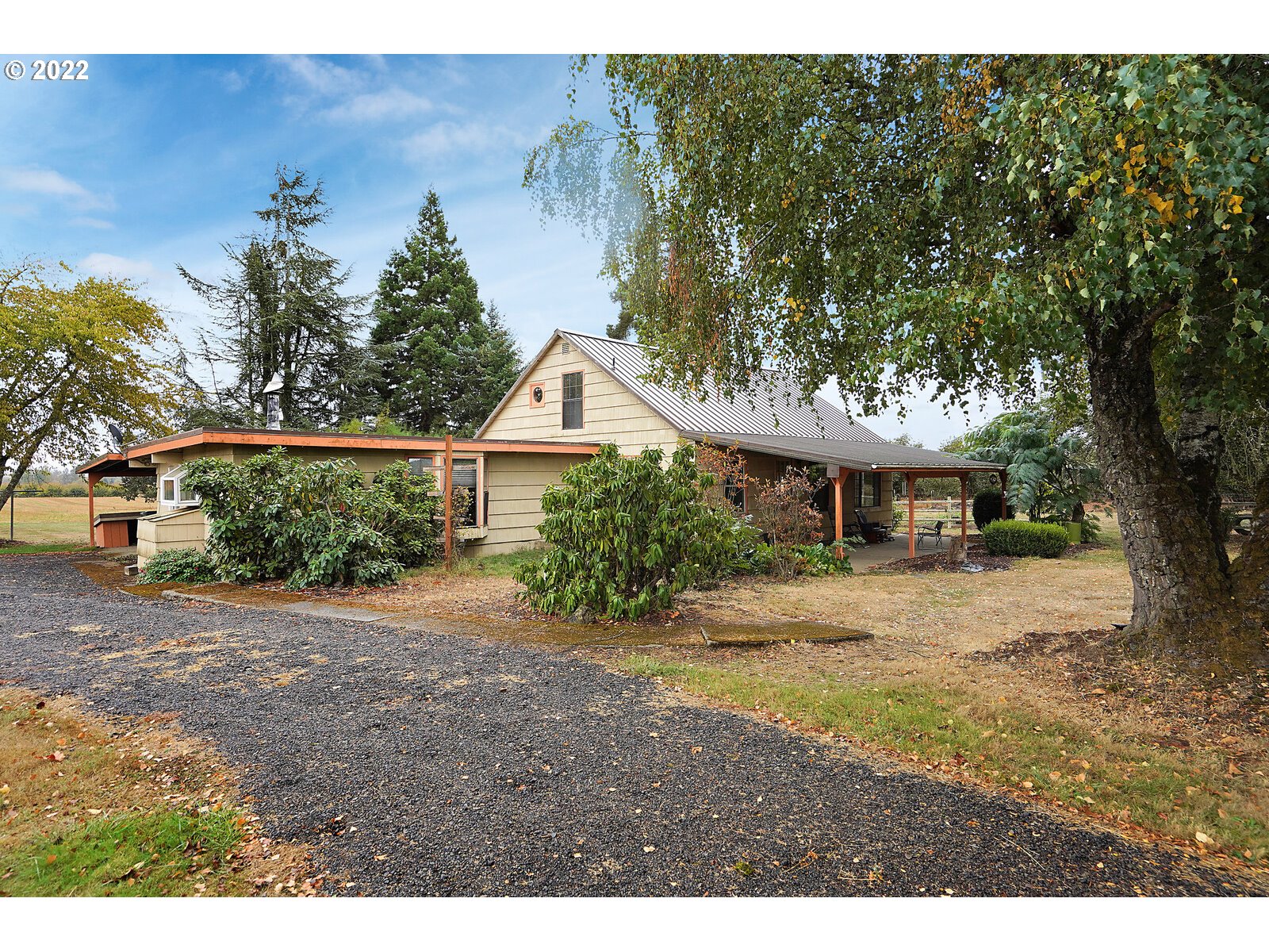 11145 Whiteaker Road Dallas, OR 97338 - Photo 5 of 32 a view of a house with a yard