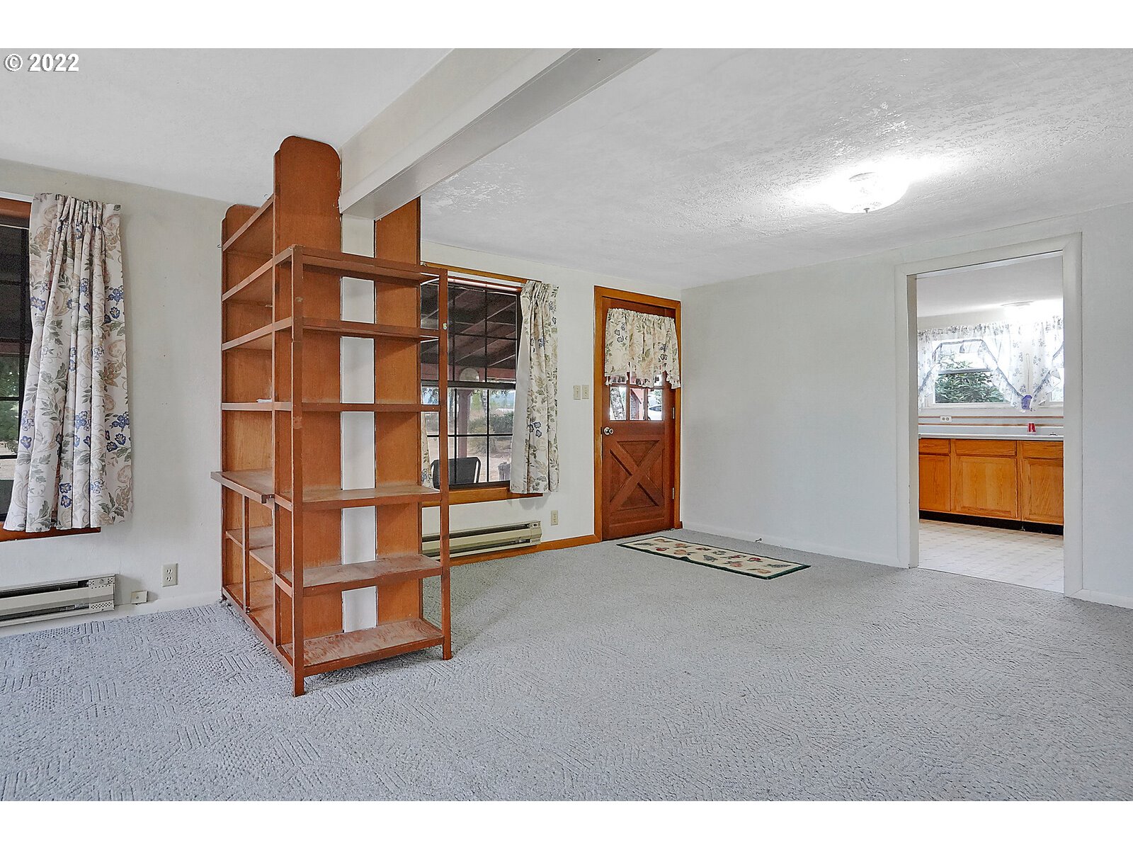 11145 Whiteaker Road Dallas, OR 97338 - Photo 8 of 32 a view of an empty room with a window