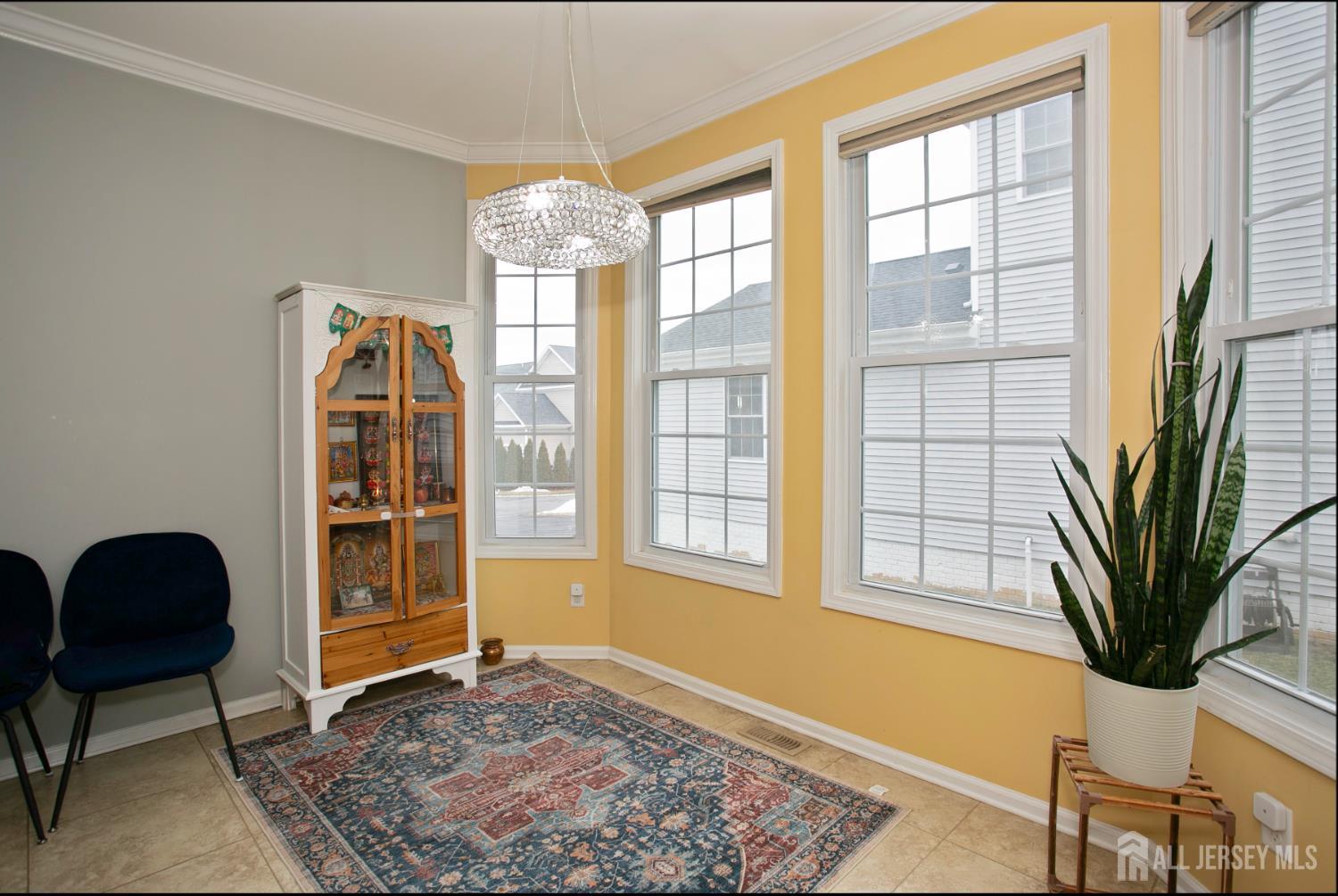 88 Bordentown Crosswicks Road Chesterfield, NJ 08515 - Photo 16 of 47 a living room with furniture and a potted plant