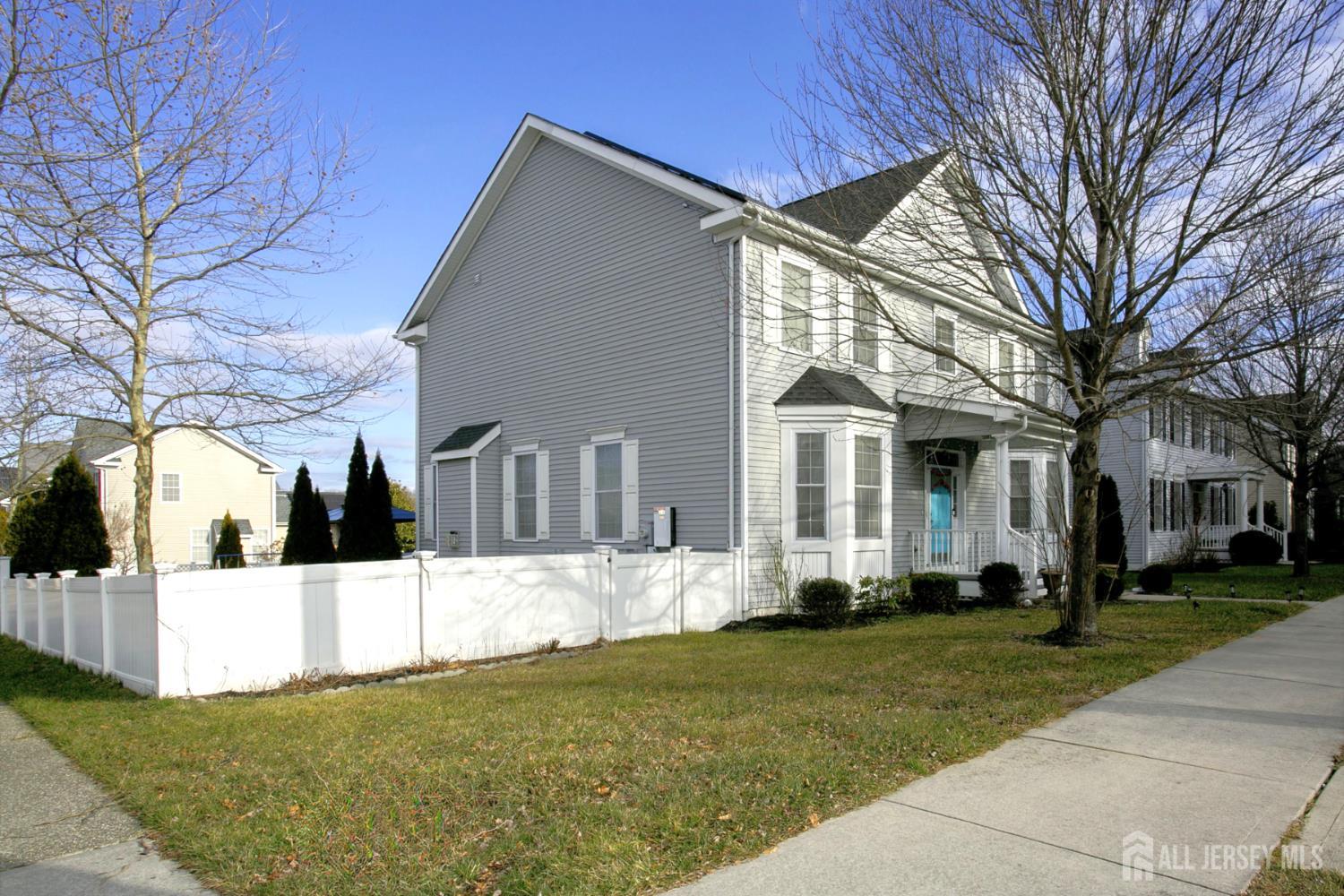 88 Bordentown Crosswicks Road Chesterfield, NJ 08515 - Photo 2 of 47 a view of a white house with a big yard and large trees