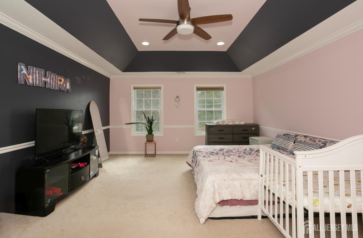 88 Bordentown Crosswicks Road Chesterfield, NJ 08515 - Photo 29 of 47 a living room with furniture a flat screen tv and a window