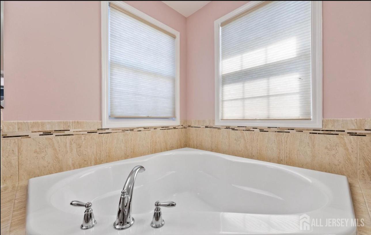 88 Bordentown Crosswicks Road Chesterfield, NJ 08515 - Photo 34 of 47 a bath tub sitting next to a window