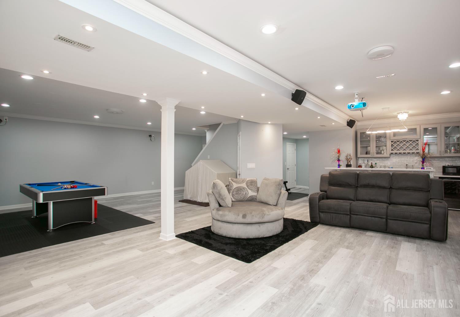 88 Bordentown Crosswicks Road Chesterfield, NJ 08515 - Photo 37 of 47 a living room with furniture and a potted plant