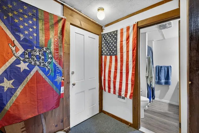 a kitchen with a stove and a microwave