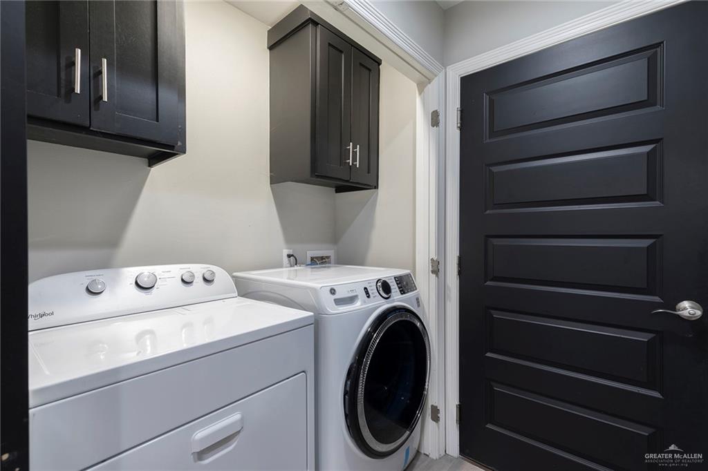 503 Northern Dancer Avenue Edinburg, TX 78539 - Photo 16 of 34 a utility room with dryer and washer