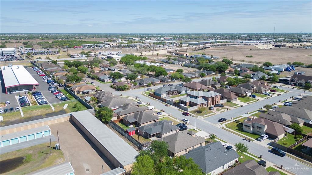 503 Northern Dancer Avenue Edinburg, TX 78539 - Photo 28 of 34 an aerial view of a city with lots of residential buildings and ocean view in back