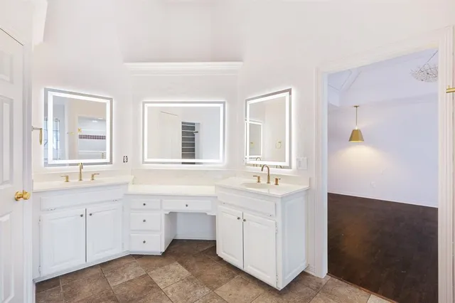 a view with a sink and a mirror