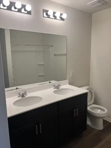 a bathroom with a sink and a toilet