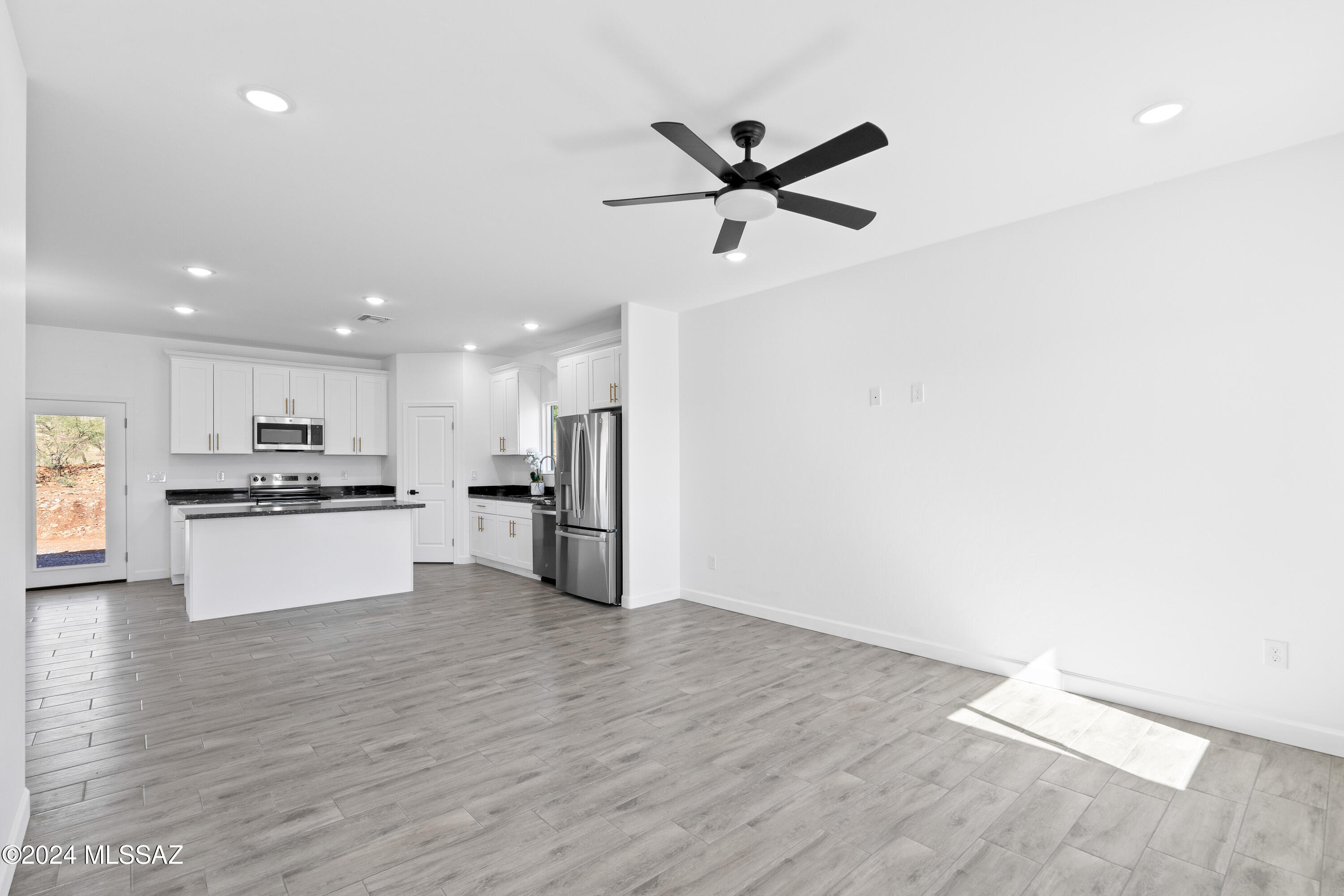 1874 Circulo Colombia Rio Rico, AZ 85648 - Photo 9 of 31 a view of kitchen with stainless steel appliances wooden floor