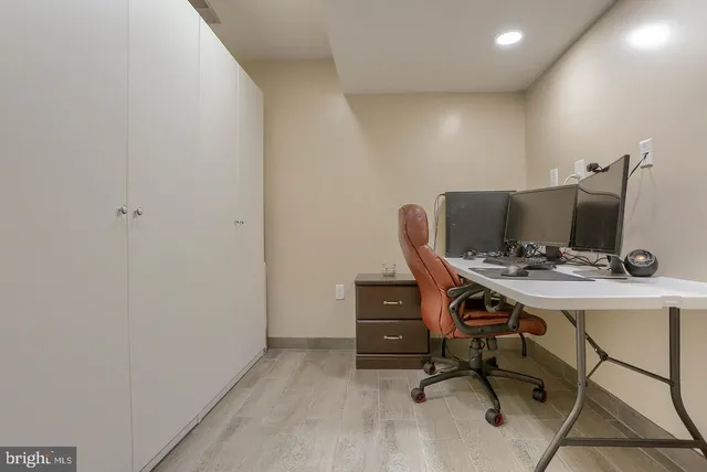 a view of a workspace with furniture